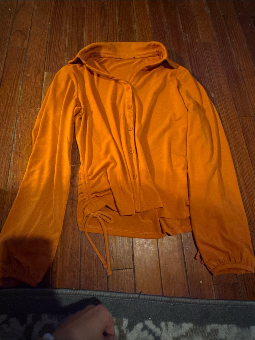 Gorgeous orange boutique stretchy top button front cinched sides